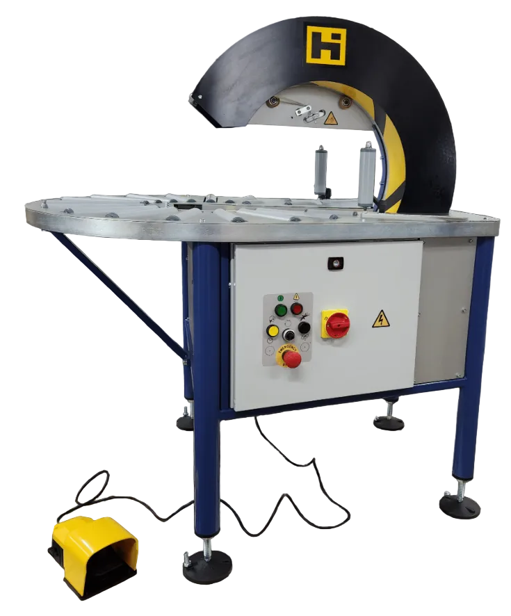 Industrial machine with control panel and warning labels on a dark background