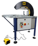 Industrial machine with control panel and warning labels on a dark background